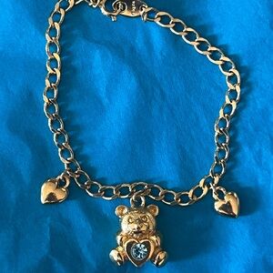 Vintage Avon gold tone child’s bear charm bracelet March birthstone aquamarine